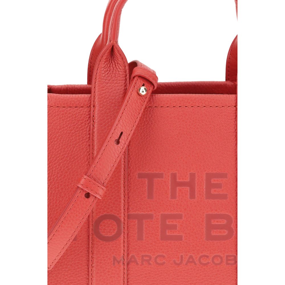 Marc Jacobs Red Calf Leather Bos Taurus Handbag featuring grained leather with adjustable strap and tubular handles