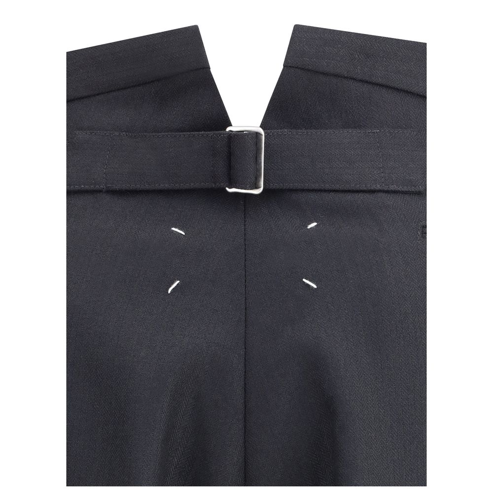 Margiela Black Wool Dress Pants back view with iconic white stitching and belt detail.