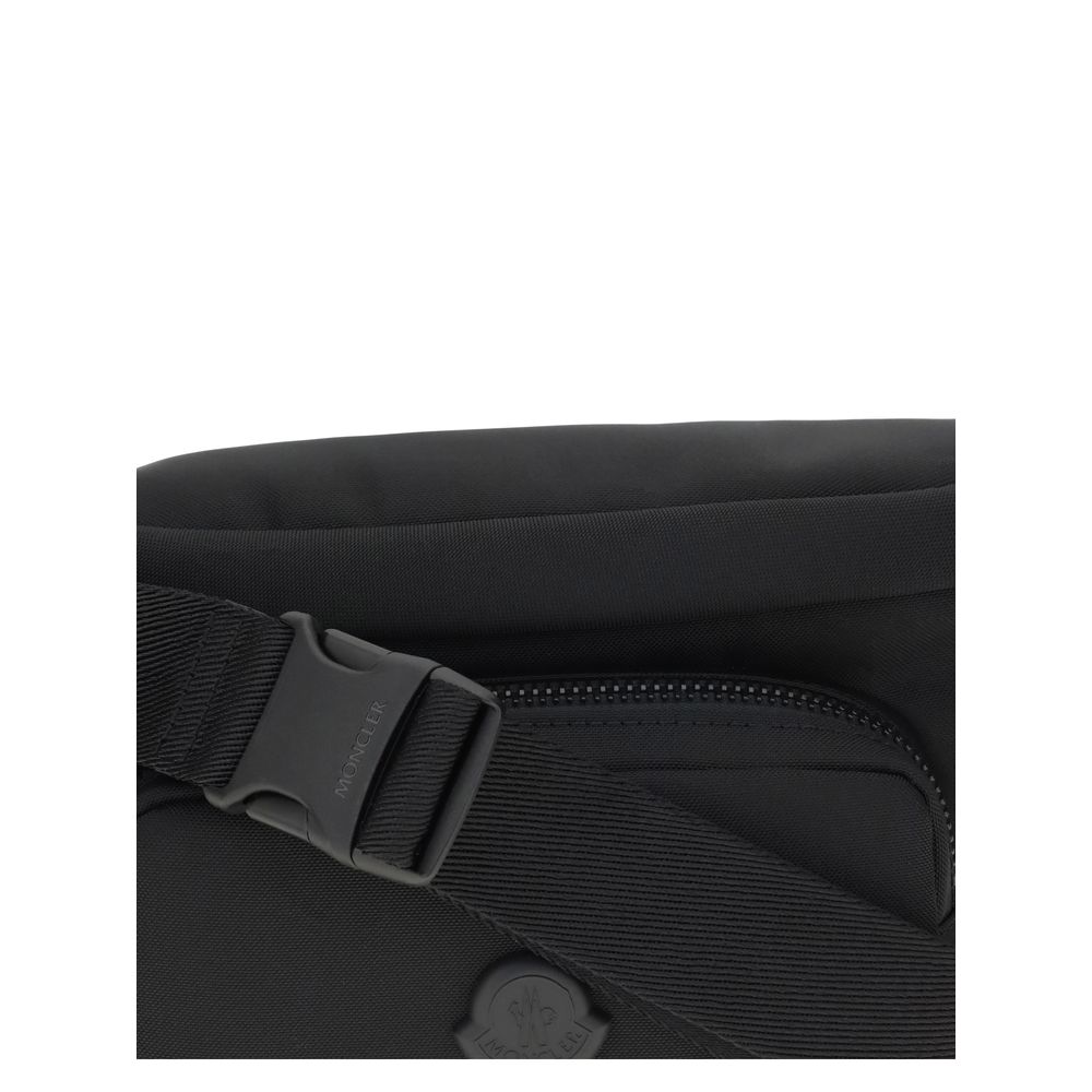 Moncler Black Nylon Clutch Bag with adjustable strap and zip closure, featuring durable water-repellent nylon and leather trim.