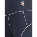 Close-up of Moncler Grenoble Leggings showing technical fabric and logo patch, designed for active lifestyle, gym, and trail use.