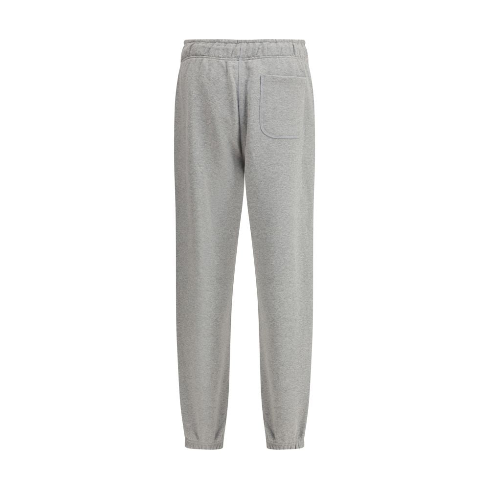 Alt Tag: New Balance Gray Cotton Joggers (Workout Pants) with elasticized waistband, adjustable drawstring, and side pockets, perfect for workouts.