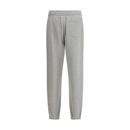 Alt Tag: New Balance Gray Cotton Joggers (Workout Pants) with elasticized waistband, adjustable drawstring, and side pockets, perfect for workouts.