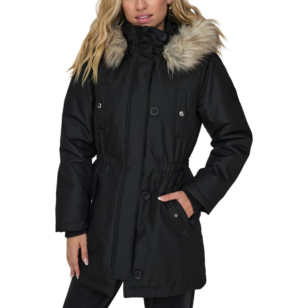 Woman wearing Only Black Polyester Parka with fur-lined hood for winter fashion and warmth.