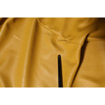 Close-up of mustard yellow fabric from PINKO Polyester Belted Shirt Midi Long Sleeve Yellow Mustard dress, showcasing faux leather texture.