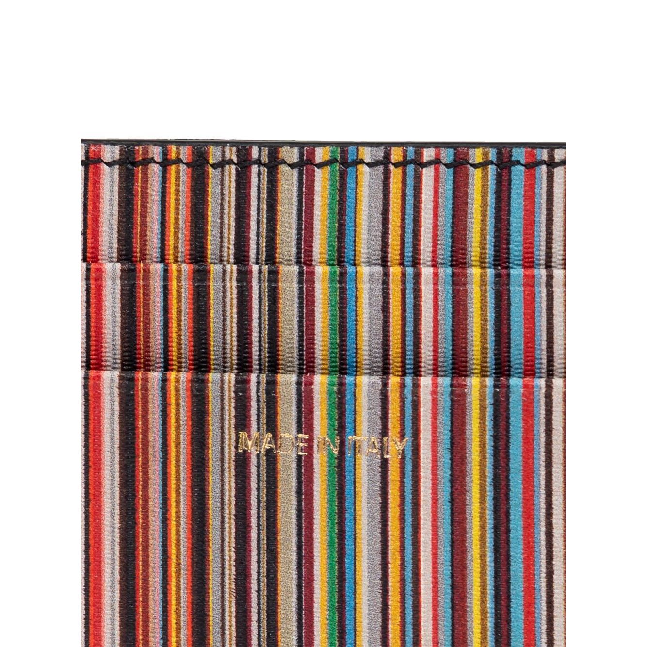 Paul Smith Signature Stripe leather card case with colorful stripe design and logo stamp, showcasing black card slots and rectangle shape.