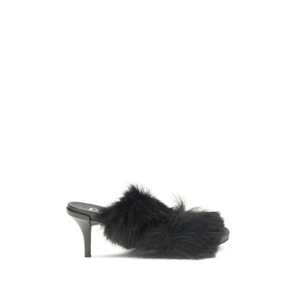 Pedro García Black Leather Stiletto Heel Sandals with fur trim and open toe, elegant footwear for AW25.
