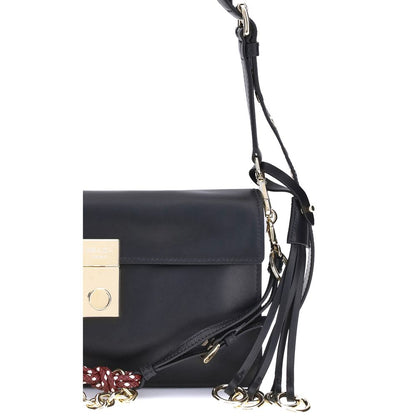 Prada Black Calf Leather Bos Taurus Shoulder Bag with metallic logo and adjustable strap, side view