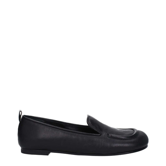 Premiata Black Leather Slip-On Loafers with round toe and low heel, featuring leather sole and back logo. MPN: PELLEM6705NERO.