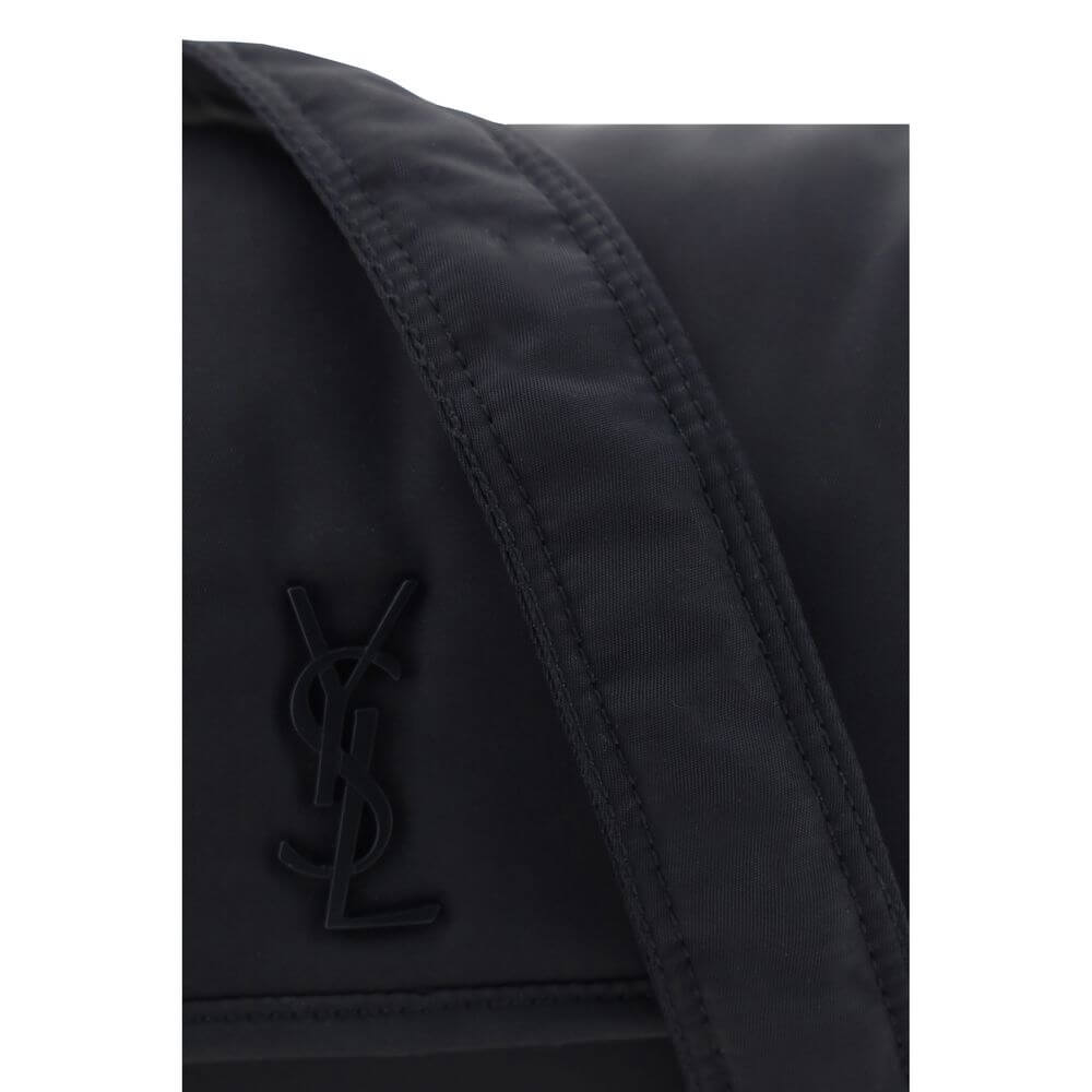 Close-up of the iconic YSL logo on a Saint Laurent Black Polyamide Shoulder Bag, showing details of its stylish design.