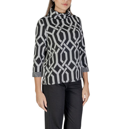 Woman wearing Street One Black Polyester Sweatshirt with scarf collar and jacquard pattern, offering stylish knitwear with comfort.