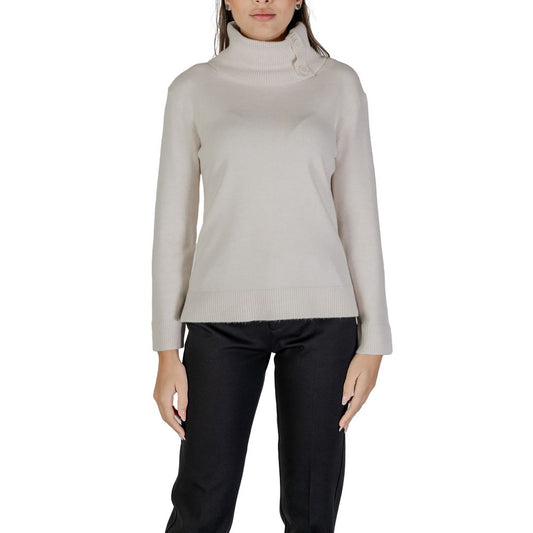 Woman wearing Street One Cream Viscose Turtleneck with side buttons, long sleeves, soft knit fabric for warmth and comfort.