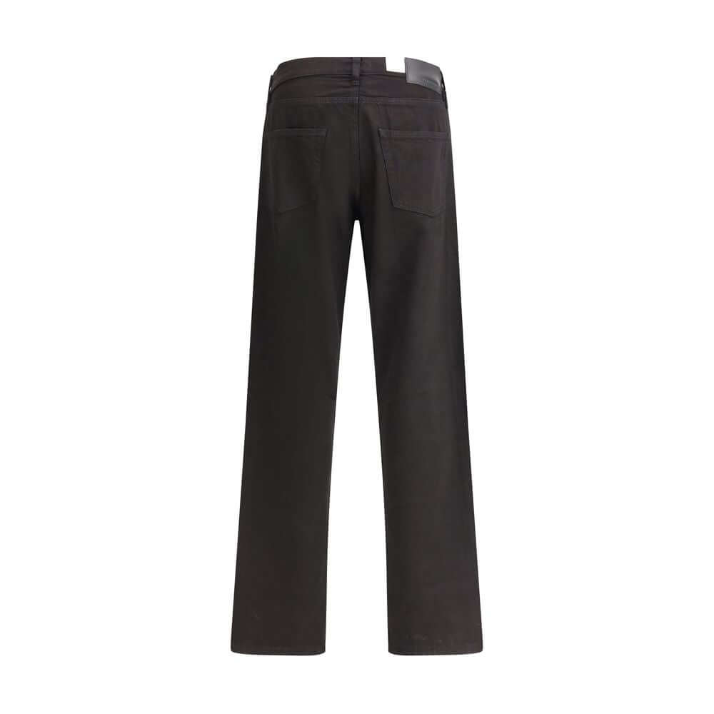 Sunflower Black Cotton Relaxed Fit Jeans with a loose fit, garment-dyed finish, and recycled metal trim, rear view.