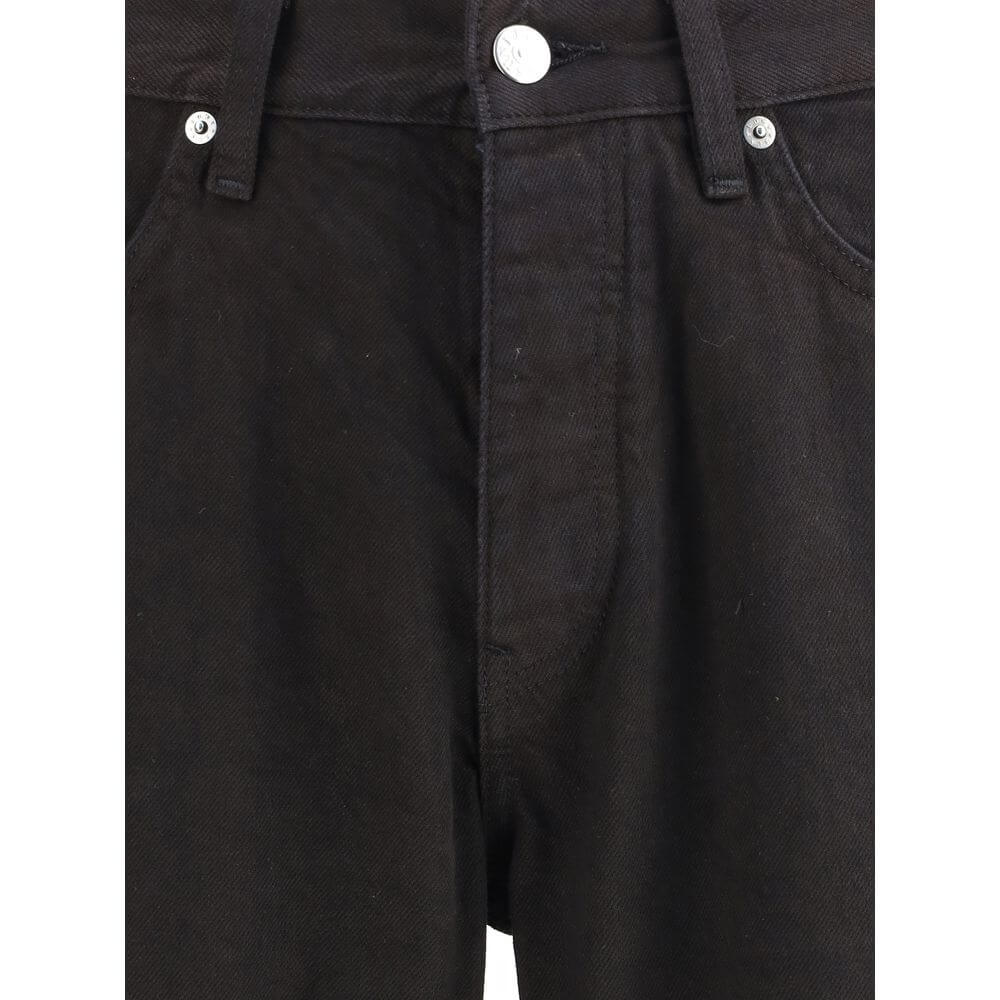 Close-up of Sunflower Black Cotton Relaxed Fit Jeans with front button, zipper closure, and belt loops.