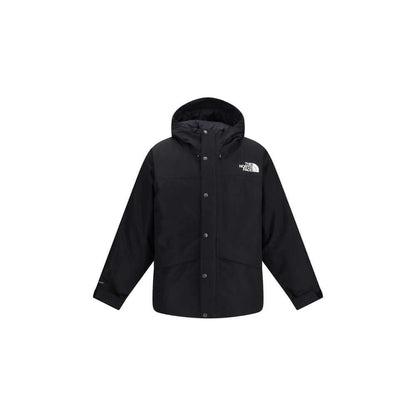 The North Face Black Polyester Coat featuring adjustable hood and secure zip pocket, ideal for harsh weather conditions.