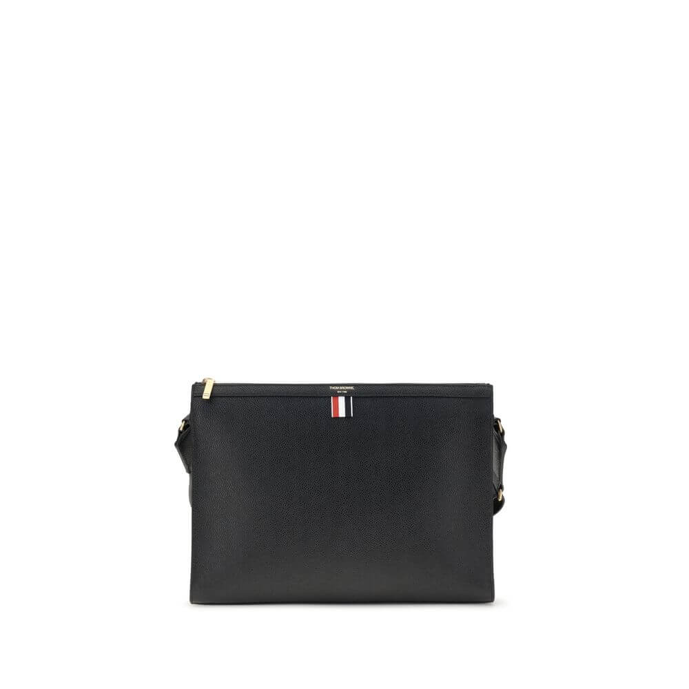 Thom Browne Black Calf Leather Bos Taurus Clutch Bag with tricolor detail and adjustable strap, front view of stylish AW25 collection.