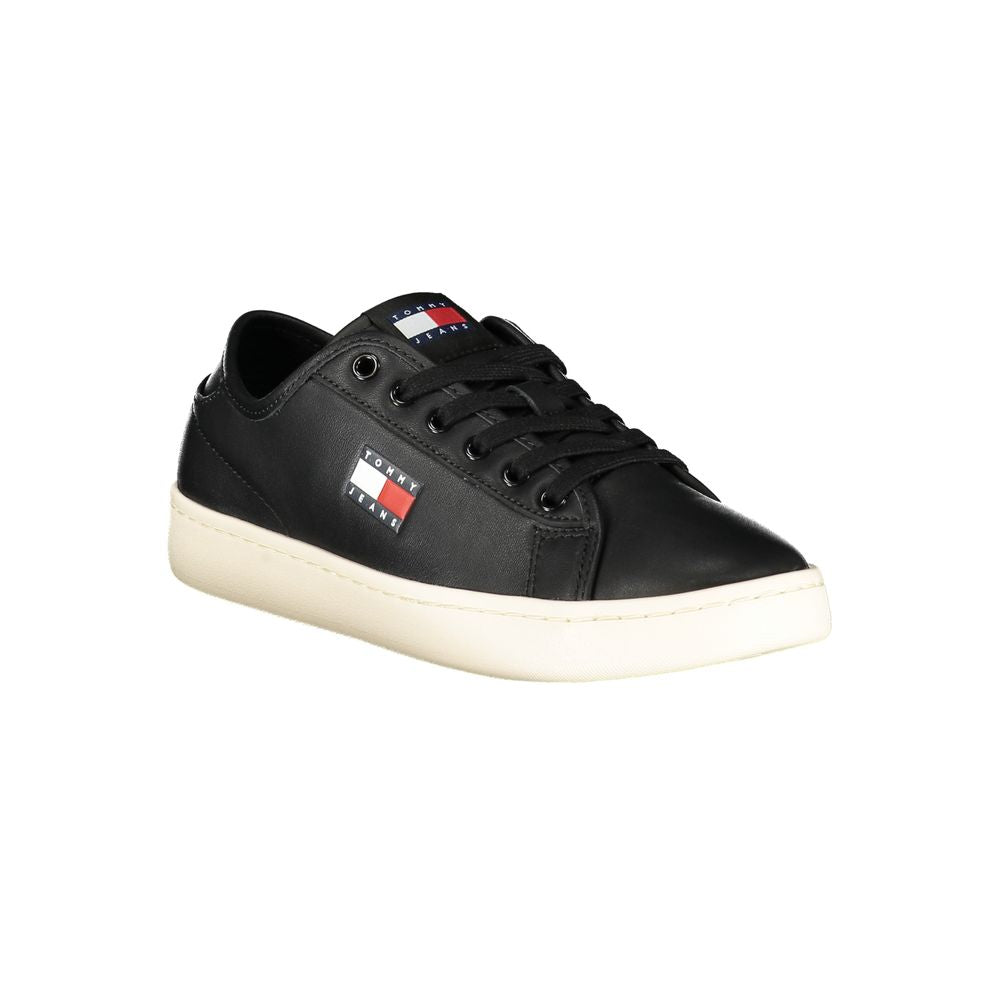 Tommy Hilfiger Black Leather Women's Sneaker with logo and removable footbed for comfort. Modern chic design for stylish flair.