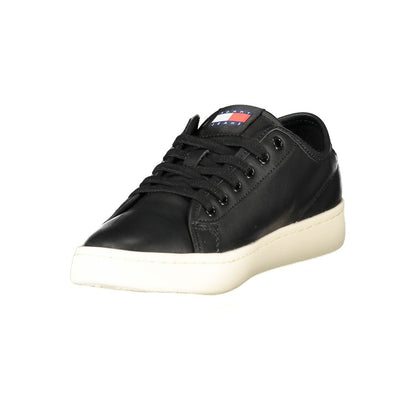 Tommy Hilfiger Black Leather Women's Sneaker, featuring sleek design and iconic logo on a white sole, perfect for chic modern style.