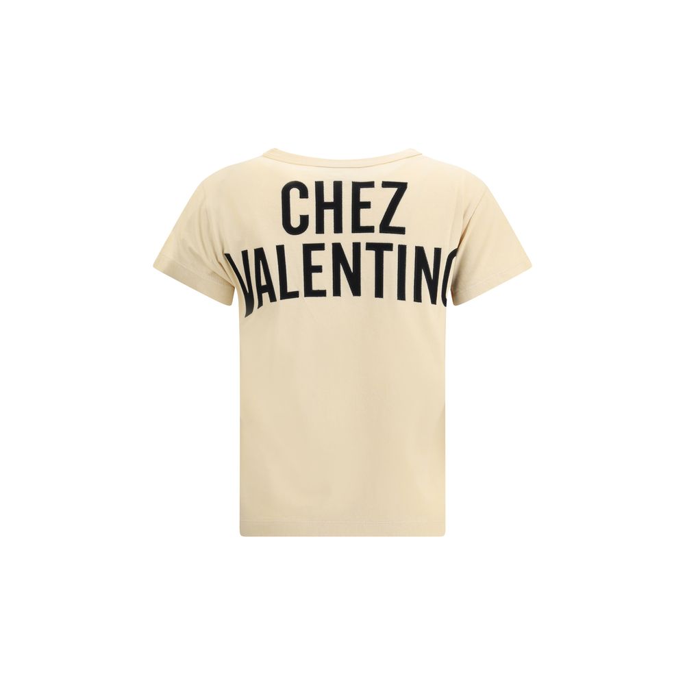 Back view of Valentino Beige Cotton T-Shirt featuring 'Chez Valentino' text in black lettering.
