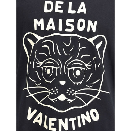 Valentino Black Cotton T-Shirt featuring Le Chat De La Maison graphic print, showcasing casual elegance with ribbed crew neck design.