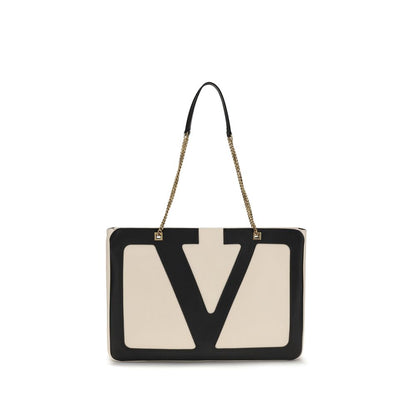 Valentino Garavani Cream Lamb Ovis Aries Aries Shoulder Bag with Signature VLogo and sliding chain. Elegant design with antiqued gold finish.