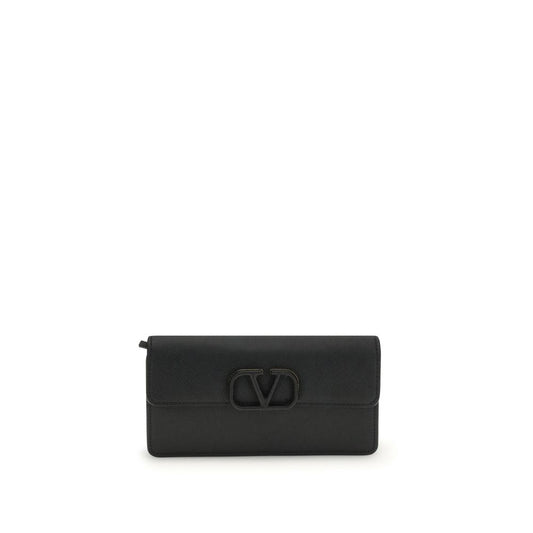 Valentino Garavani VLogo Shoulder Bag in black leather with flap closure and chain strap.