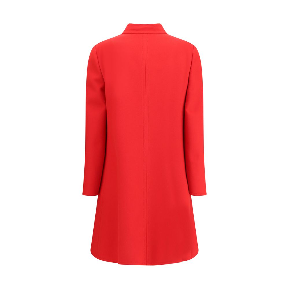 Back view of Valentino Red Fleece Wool Coat showcasing elegant tailored design and vibrant color.