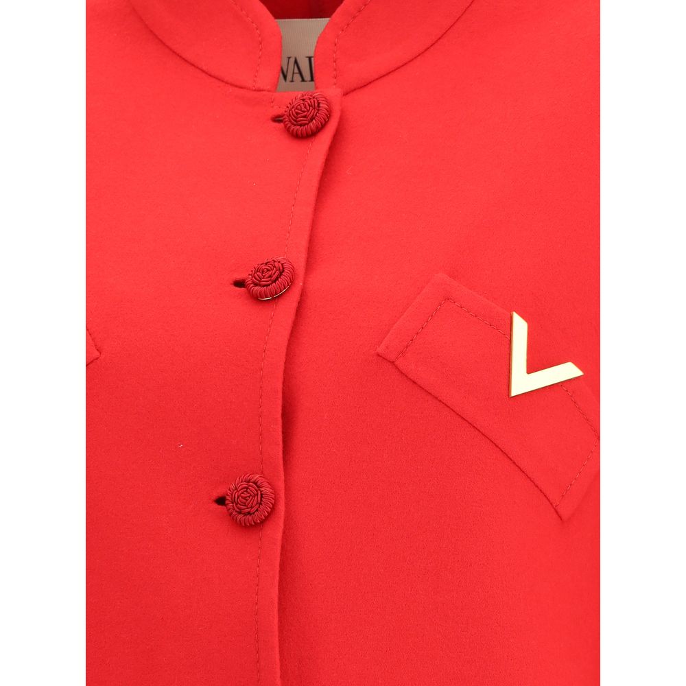 Close-up of Valentino Red Fleece Wool Coat showcasing soutache buttons and VLogo detailing.