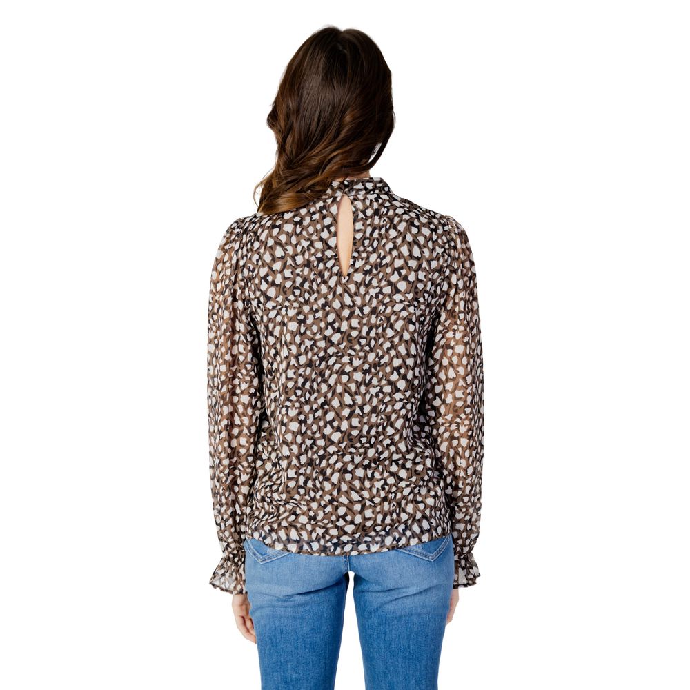 Rear view of woman wearing Vila Clothes Black Recycled Polyester Blouse, showing elegant design with semi-sheer patterned fabric.