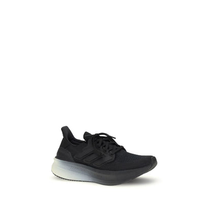 Y-3 Black Fabric Athletic Sneakers with BOOST midsole and Yohji Yamamoto's signature on TPU heel cage, stylish and comfortable.