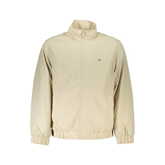 Tommy Hilfiger beige men's jacket, sustainable design, recycled nylon with zip closure, elastic cuffs, waist, and logo.
