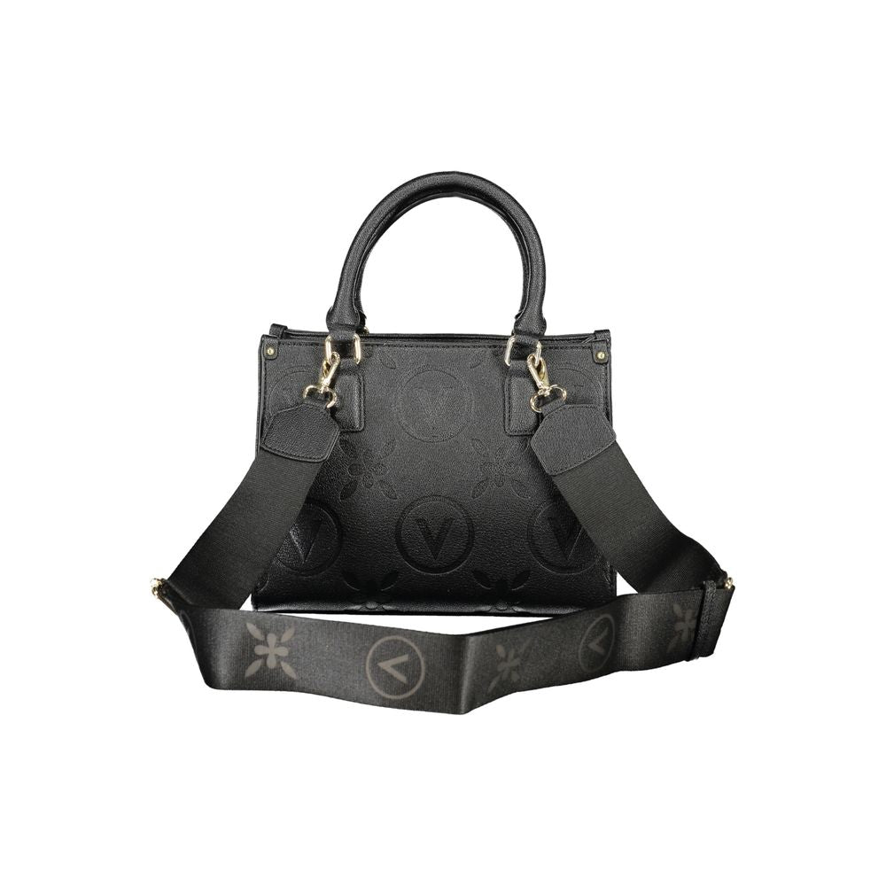 Front view with bag zipped and handles upright.